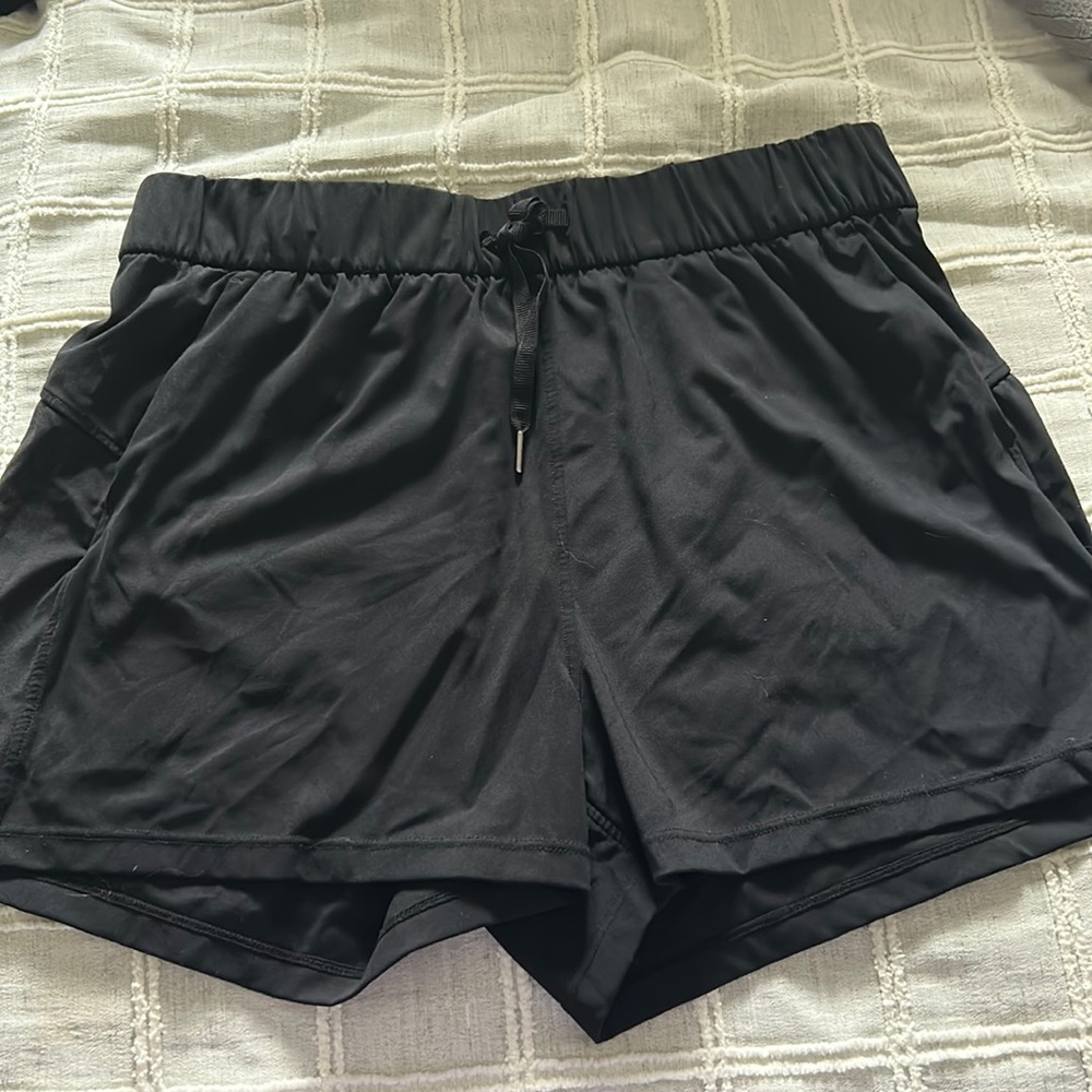 COPY - Set of 4 athletic workout shorts for women. Black size medium for all.